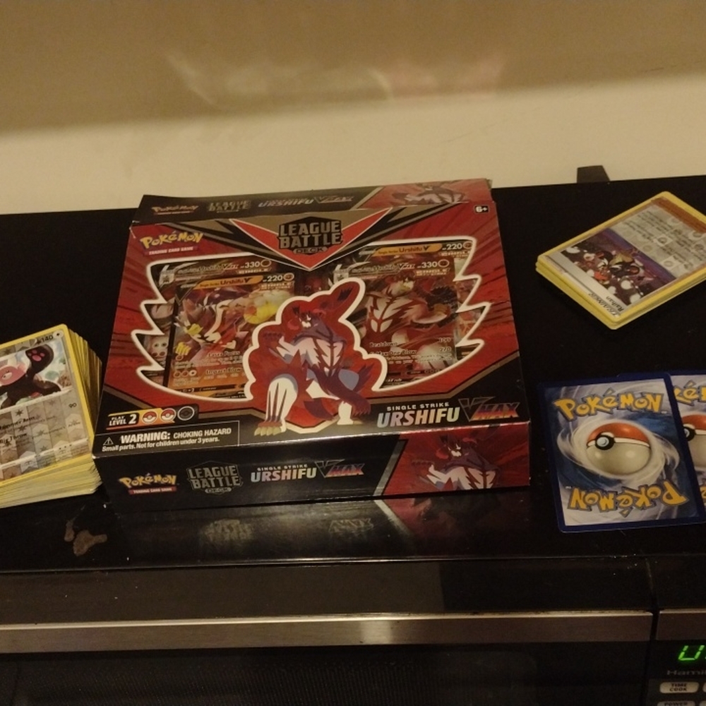 League battle deck  57 holo and reverse holo pokemon 17 holo trainers 2 surprise